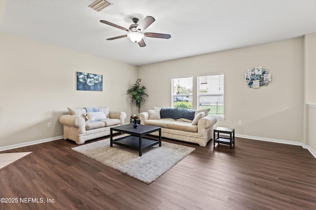2360 Golfview Dr, Fleming Island, FL 32003 - living area with a ceiling fan, dark wood-type flooring, and baseboards