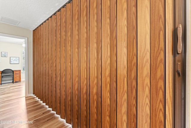 2360 Golfview Dr, Fleming Island, FL 32003 - stairs featuring wood finished floors and a textured ceiling