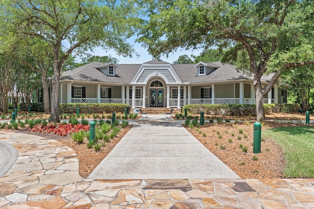 2360 Golfview Dr, Fleming Island, FL 32003 - view of front of home featuring a porch and a shingled roof