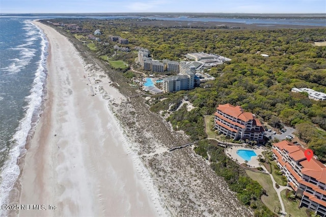 bird's eye view with a view of the beach and a water view