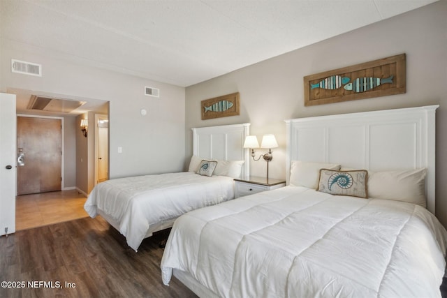 bedroom featuring dark hardwood / wood-style floors