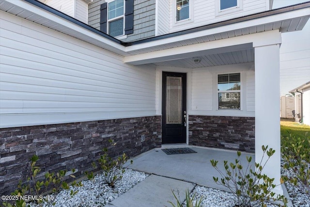 entrance to property with a porch