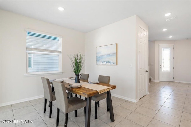 dining room featuring light tile patterned floors