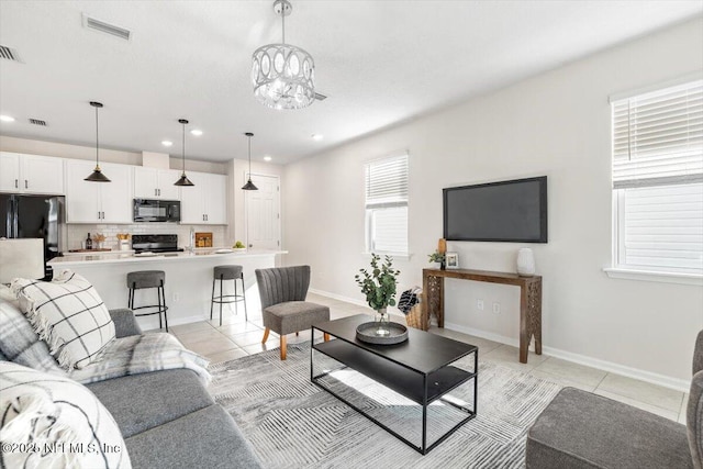 living room featuring light tile patterned floors