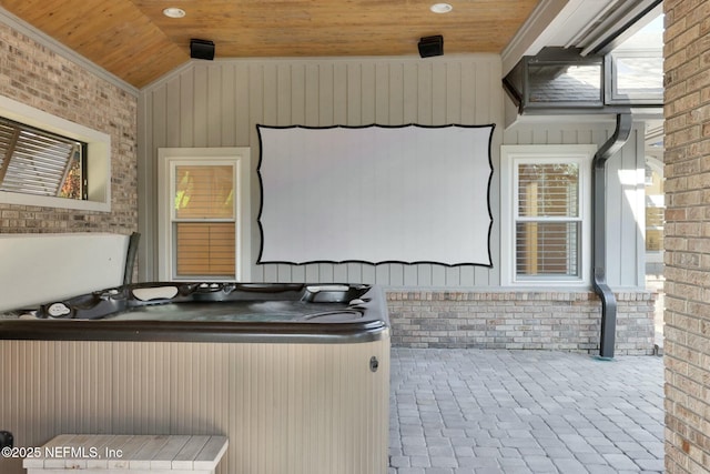 view of patio / terrace with a hot tub