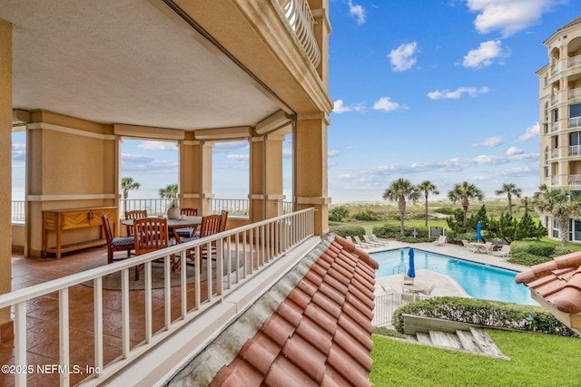 balcony featuring a patio area