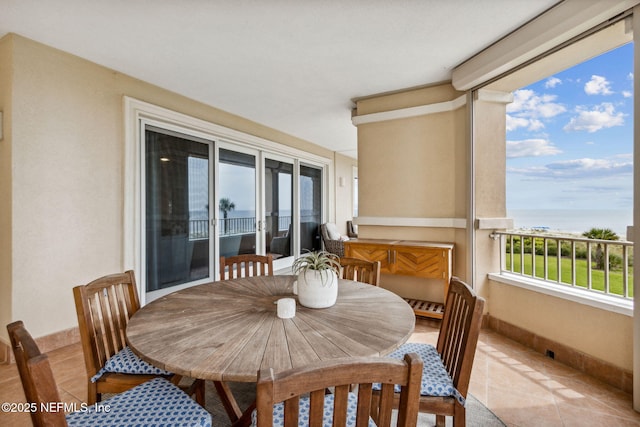 balcony featuring a water view