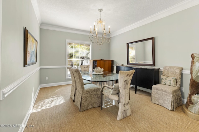 dining room with baseboards, light colored carpet, ornamental molding, a textured ceiling, and a chandelier