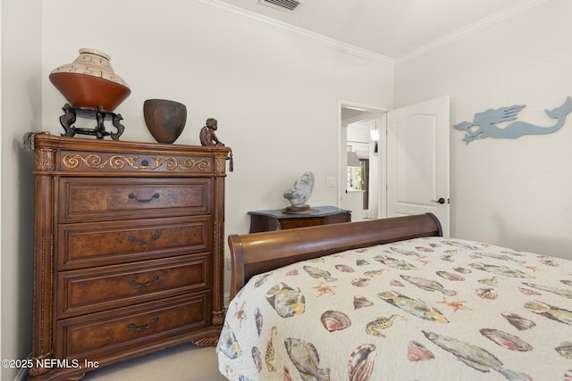 bedroom featuring visible vents and crown molding