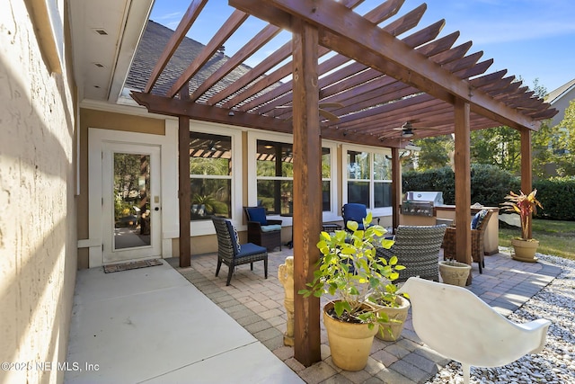 view of patio / terrace featuring area for grilling and a pergola