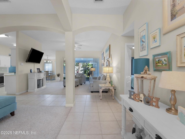 interior space featuring ceiling fan