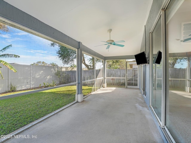 exterior space with ceiling fan