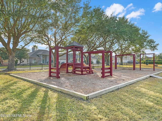 view of jungle gym featuring a yard