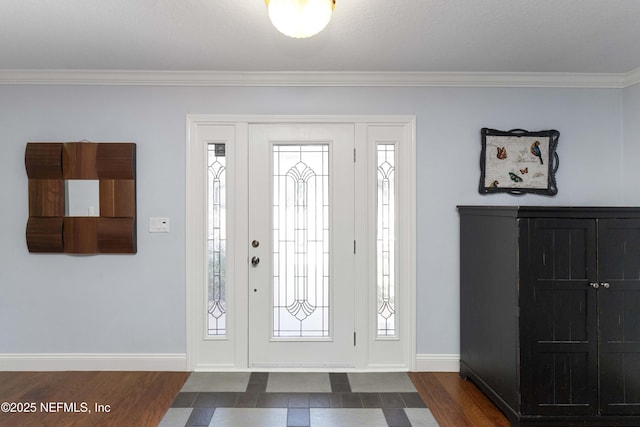 foyer with dark hardwood / wood-style flooring and crown molding