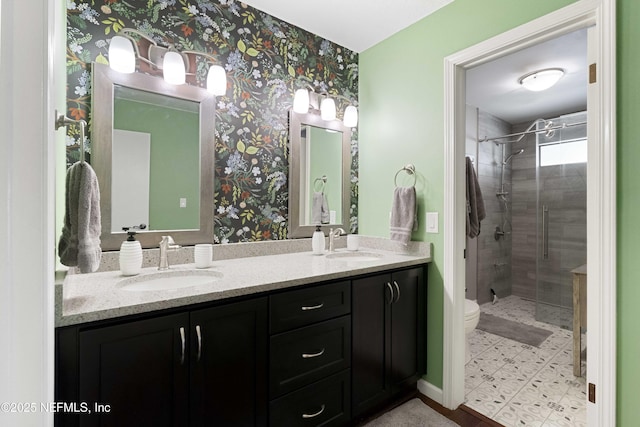 bathroom featuring walk in shower, vanity, and toilet