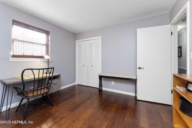 office space with dark wood-type flooring