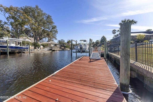 view of dock with a water view