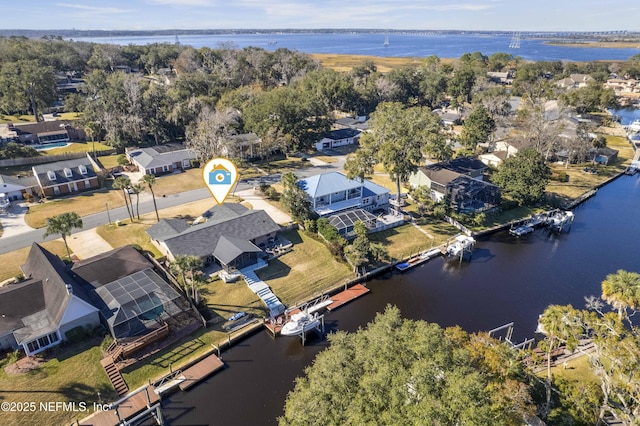 drone / aerial view featuring a water view