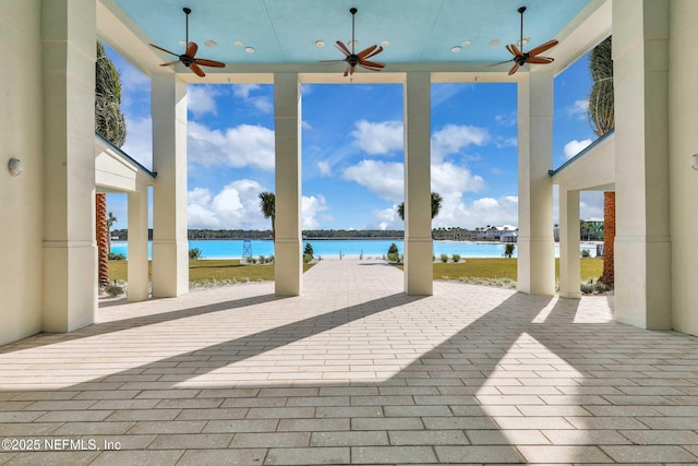 view of patio / terrace featuring a water view