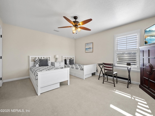 bedroom with light colored carpet and ceiling fan