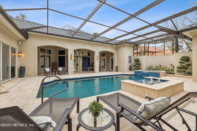 view of swimming pool featuring an in ground hot tub, a patio, glass enclosure, and french doors