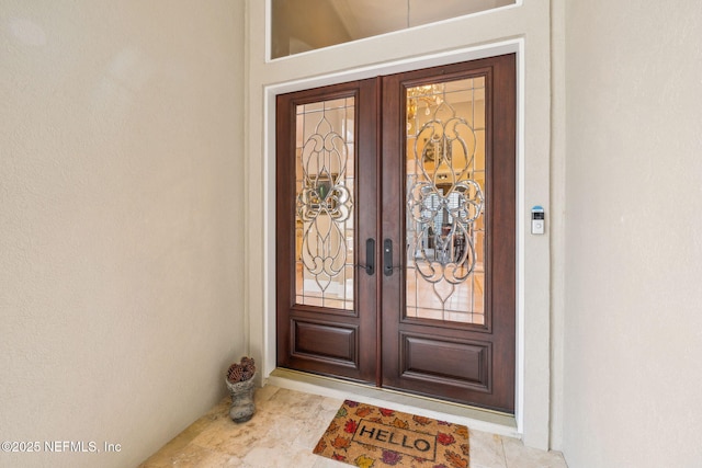 property entrance featuring french doors