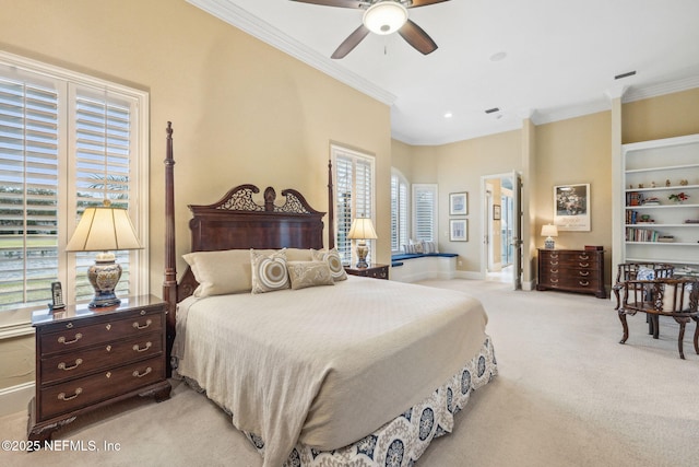 bedroom featuring ceiling fan, ornamental molding, and light carpet