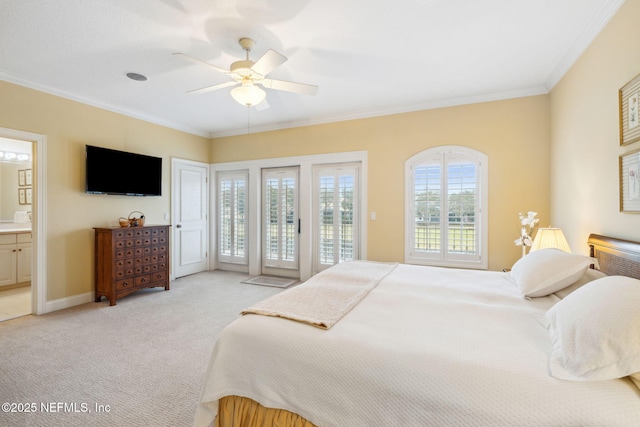 carpeted bedroom featuring crown molding, ensuite bath, ceiling fan, and access to outside