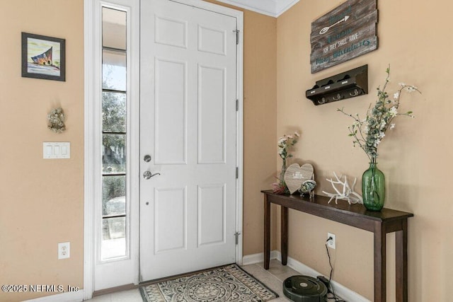 entrance foyer featuring light tile patterned flooring