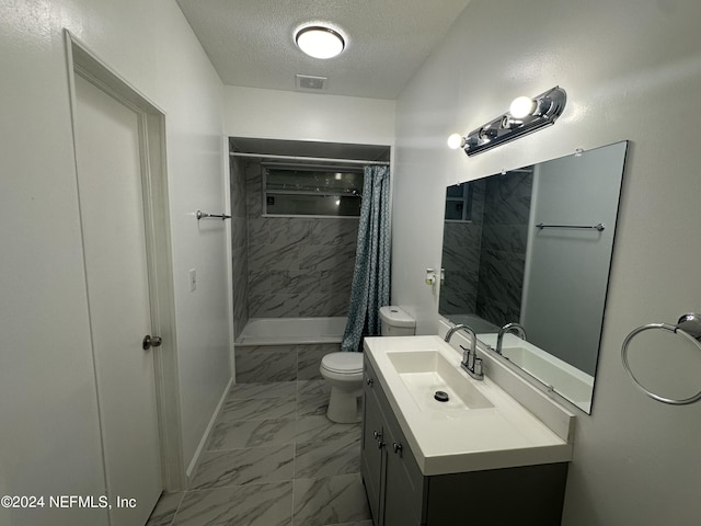 bathroom featuring toilet, vanity, a textured ceiling, and a shower with curtain