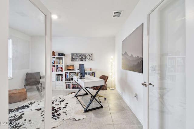 office area featuring light tile patterned floors and french doors