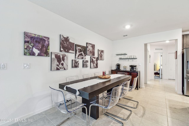 view of tiled dining space