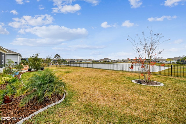 view of yard featuring a water view