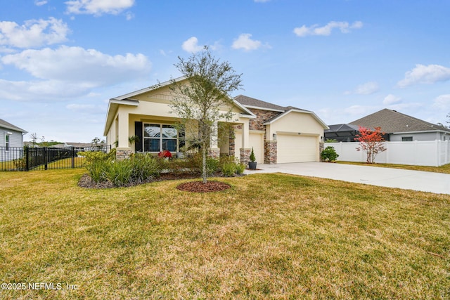 view of front of property featuring a garage and a front yard