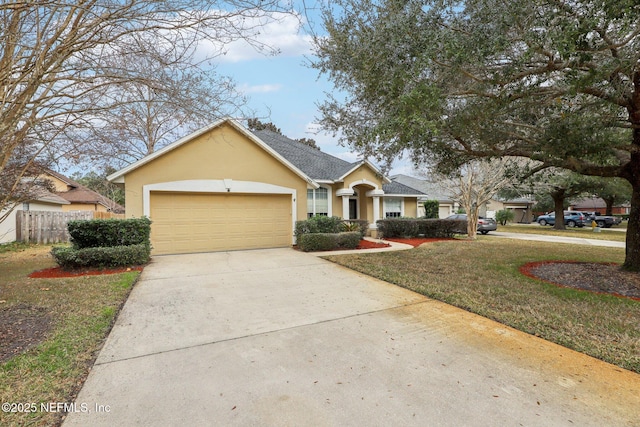 view of front facade with a garage and a front lawn