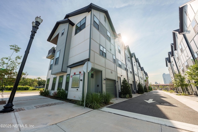 view of building exterior featuring a garage