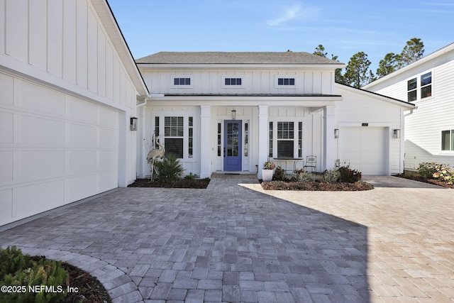 modern farmhouse style home with a garage