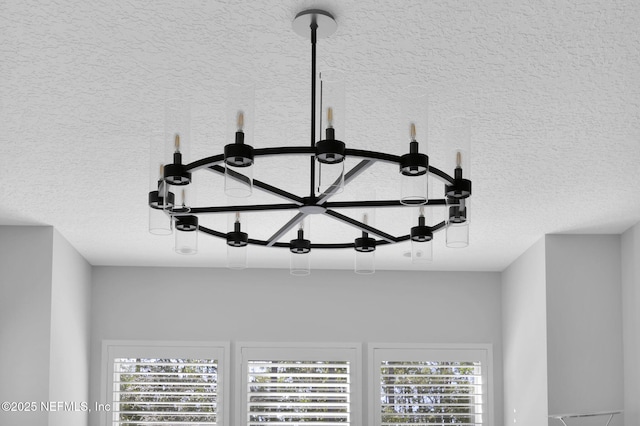 interior details featuring a textured ceiling