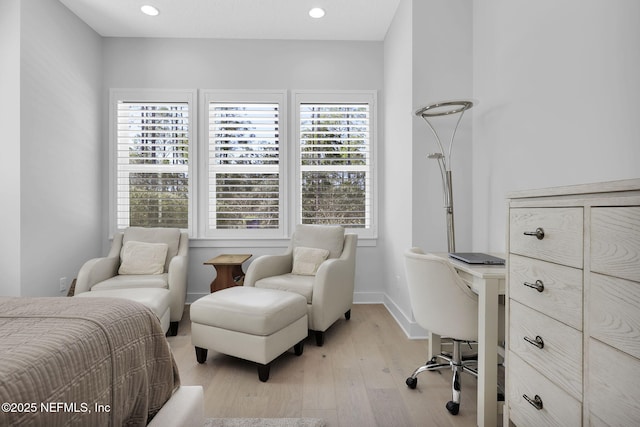 bedroom with light hardwood / wood-style flooring