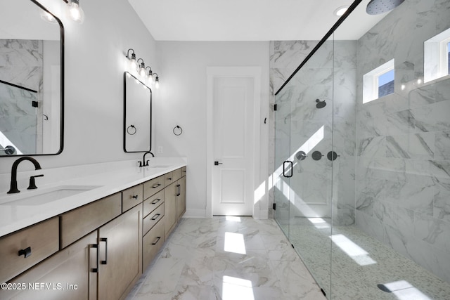 bathroom featuring vanity and a shower with shower door