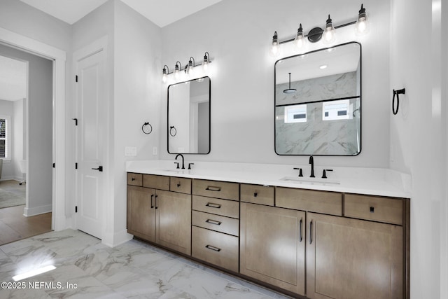 bathroom featuring vanity and a shower