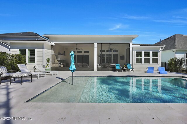 rear view of property featuring a patio and ceiling fan