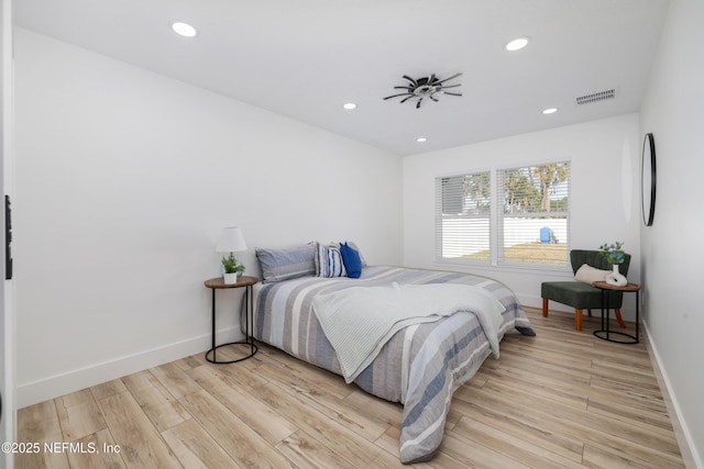 bedroom featuring light wood-type flooring