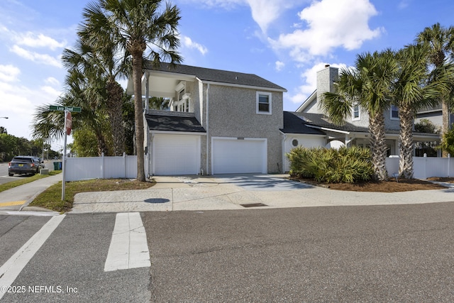 view of front of home with a garage