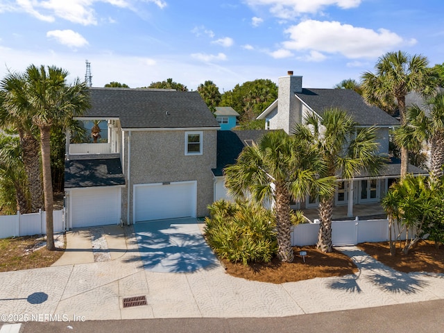 view of front of home with a garage