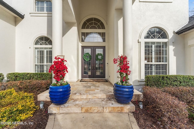 doorway to property with french doors