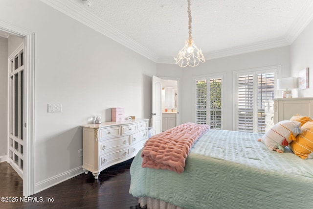 bedroom featuring dark wood-type flooring, ornamental molding, a chandelier, and a textured ceiling