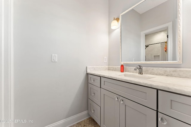 bathroom featuring vanity and a shower with shower curtain