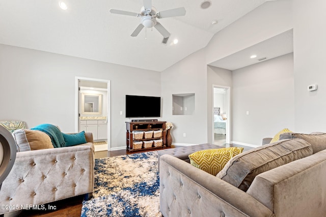 living room with ceiling fan, wood-type flooring, and vaulted ceiling