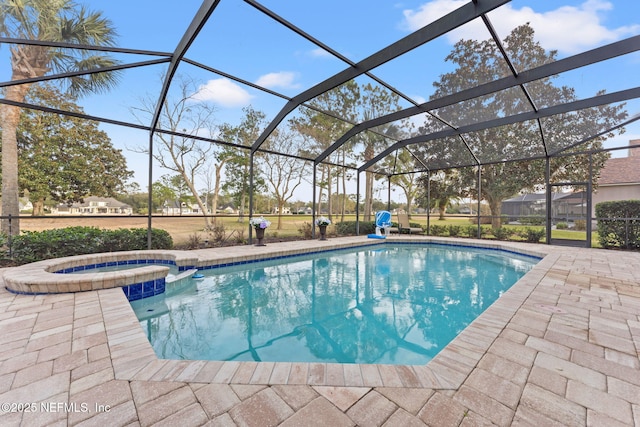 view of swimming pool featuring an in ground hot tub, a patio, and glass enclosure